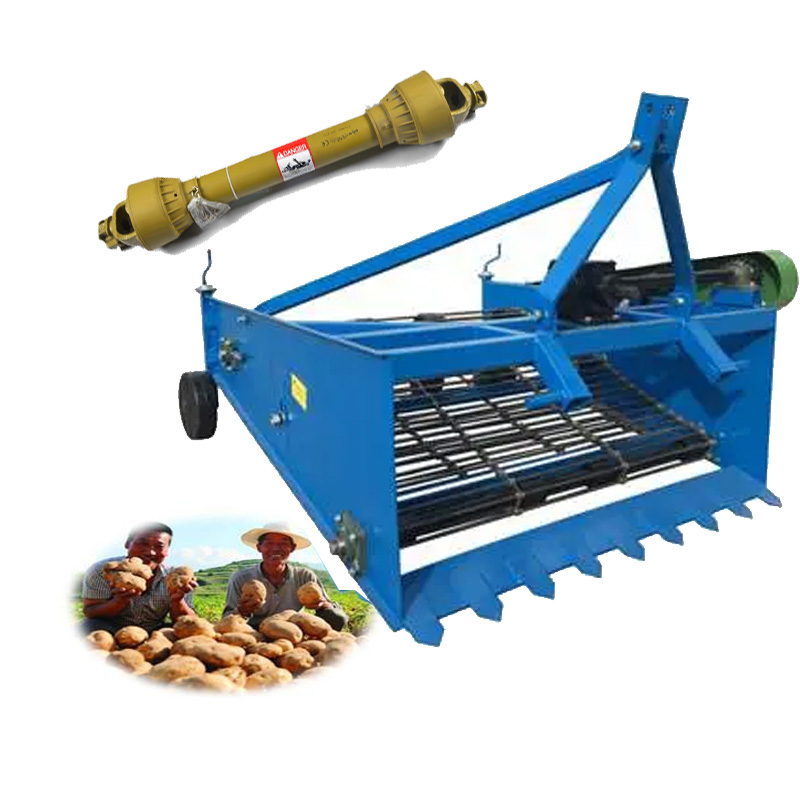 Potatoes Harvester Driving by Tractor